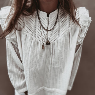 Loryn smocked white linen blouse