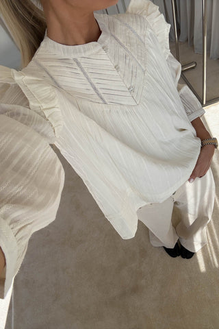 Loryn smocked white linen blouse