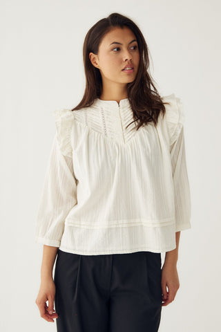 Loryn smocked white linen blouse