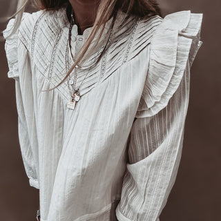 Loryn smocked white linen blouse