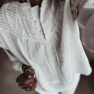 Loryn smocked white linen blouse