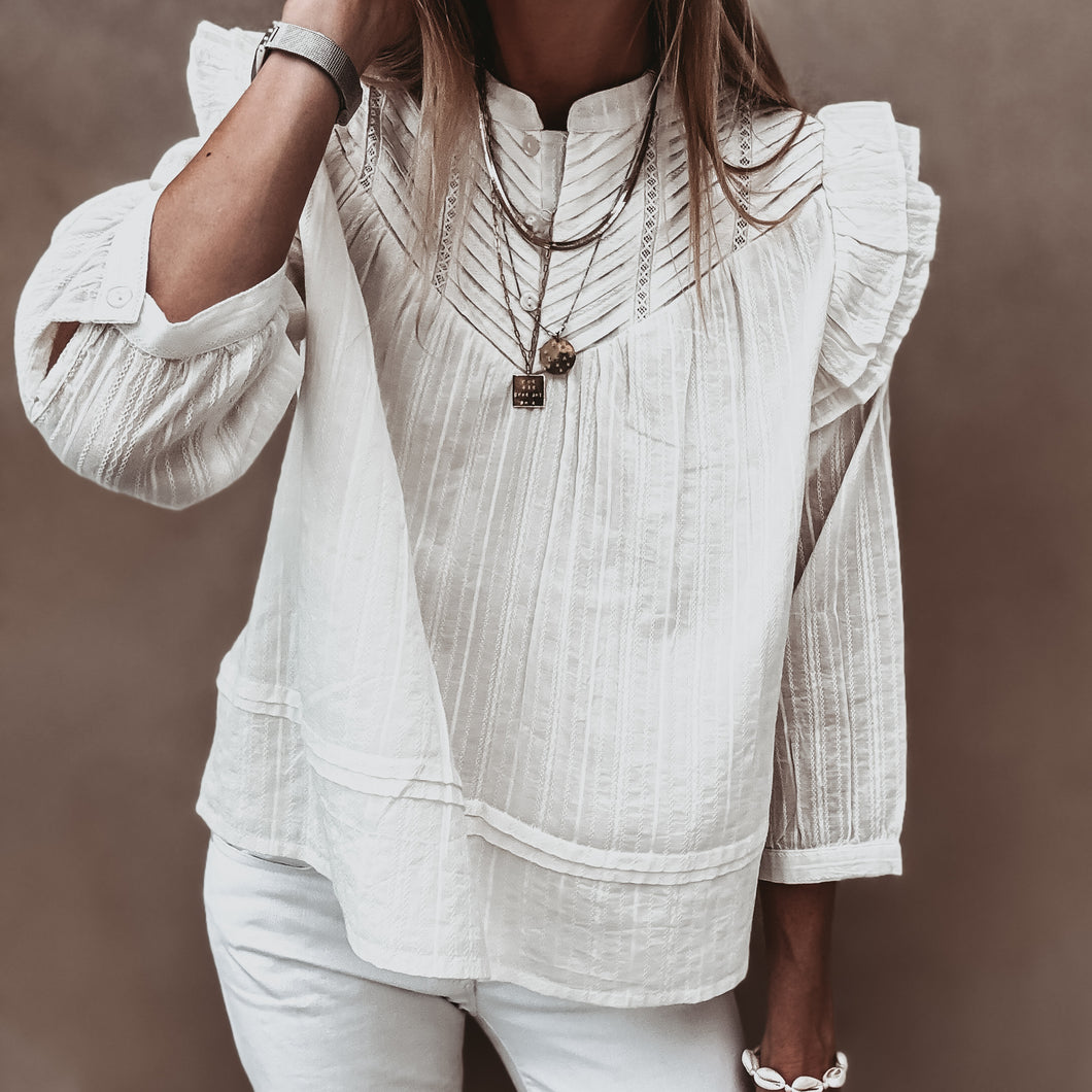 Loryn smocked white linen blouse