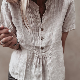 Sand Scarlet smocked white linen blouse