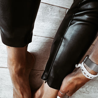 Assos black faux leather skinny pants