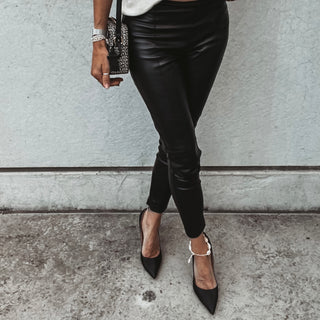 Assos black faux leather skinny pants