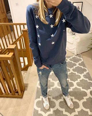 Little white stars on dark blue sweatshirt (size medium, UK 12-14)