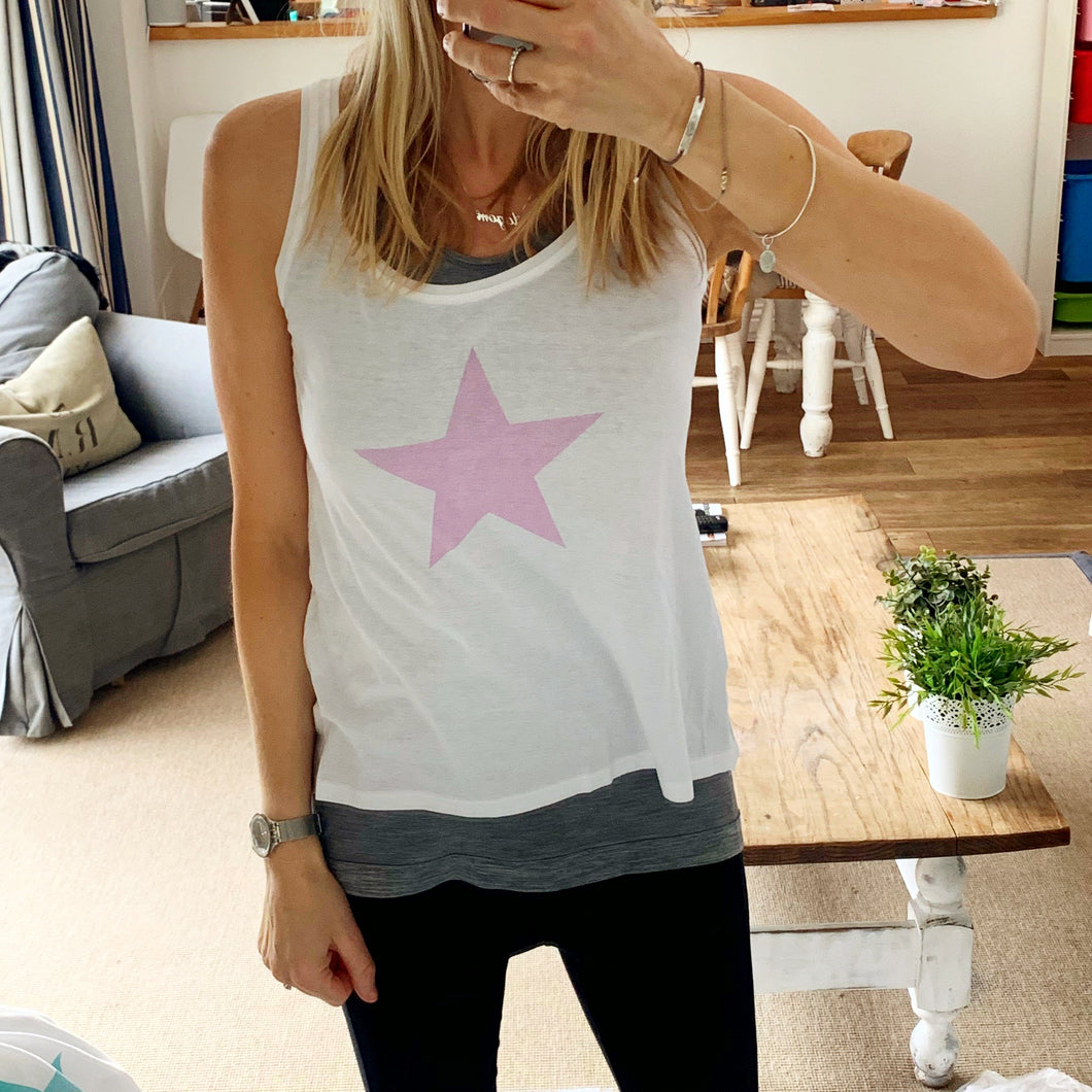 Pink star vest (small, UK 10)