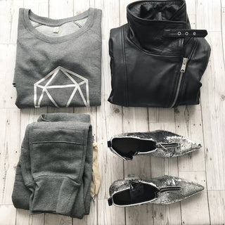 Metallic silver octahedron on a dark grey sweat