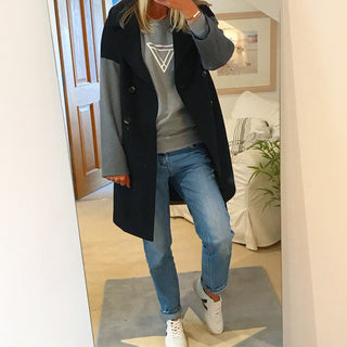 White triangles on light grey sweat