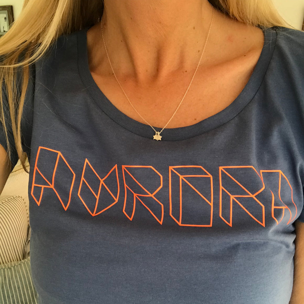 Neon orange Aurora triangle font on denim blue tee