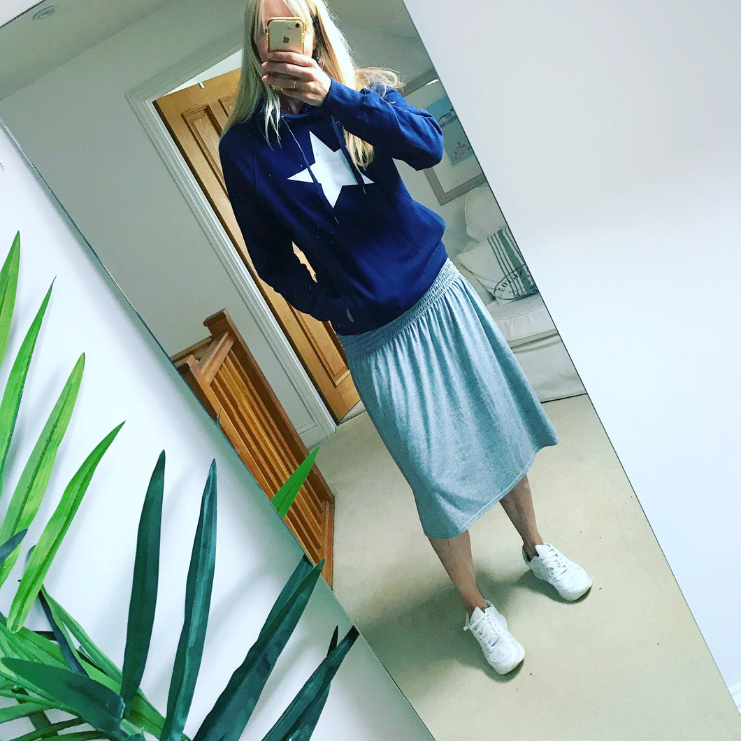 White star on navy hoody (s)