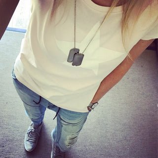 White star on pink tee