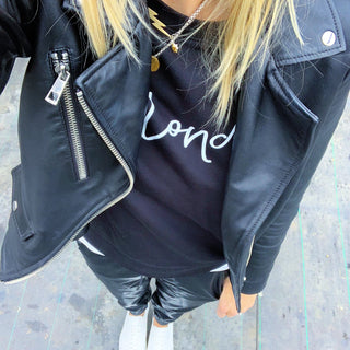 White blonde on black sweatshirt *fitted style*