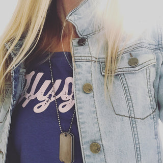 Pink hygge on denim blue tee *pre-loved*