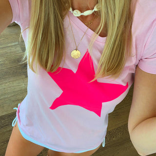 Neon pink star on pink tee