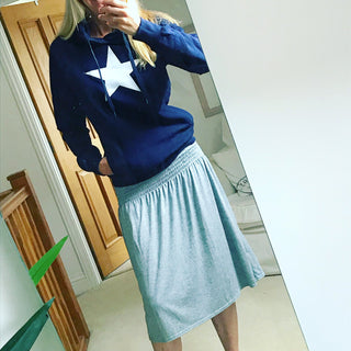 White star on navy hoody (s)