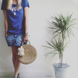 Pink hygge on denim blue tee *pre-loved*