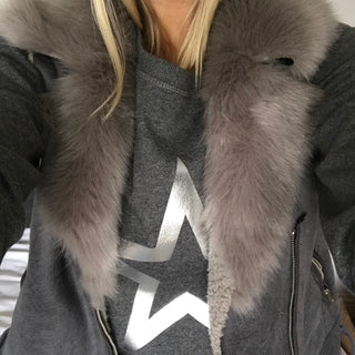 Silver star outline on a dark grey sweat (M)