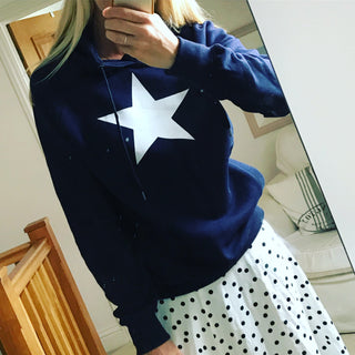 White star on navy hoody (s)