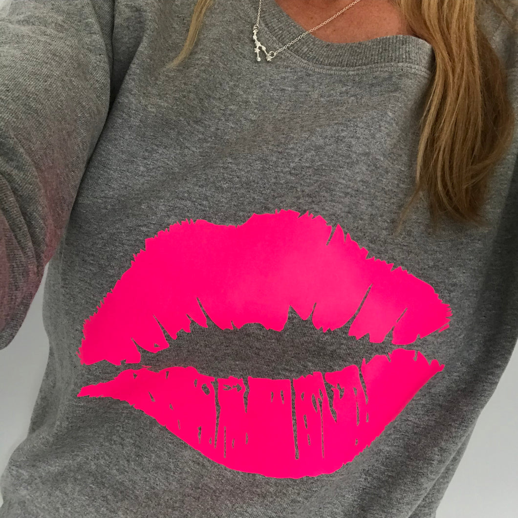 Neon pink lips on grey sweat (M)