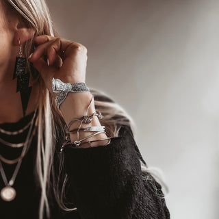 Large black glitter lightning strike earrings