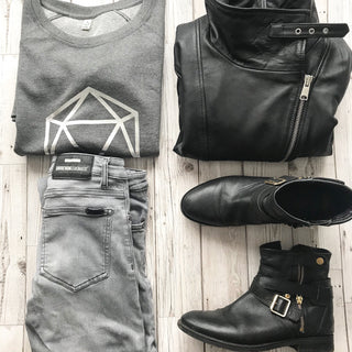 Metallic silver octahedron on a dark grey sweat