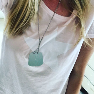 White star on pink tee