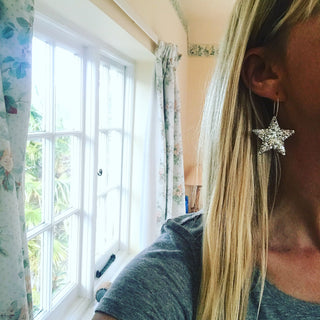 Large silver glitter star hoop earrings