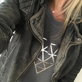 Silver pyramid on a dark grey sweat (M)
