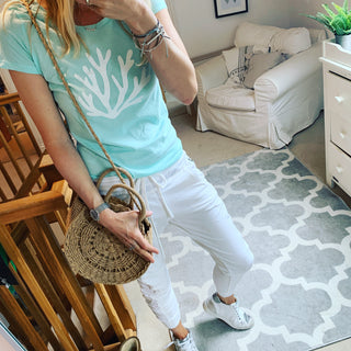 White coral on mint green tee