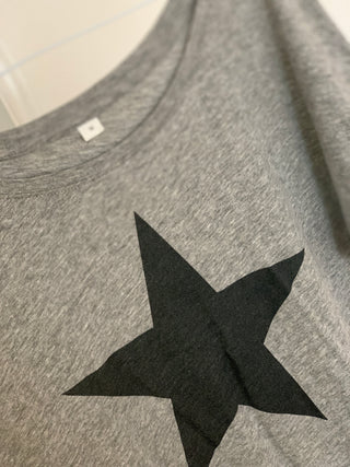 Black star on a grey tee (size 12)